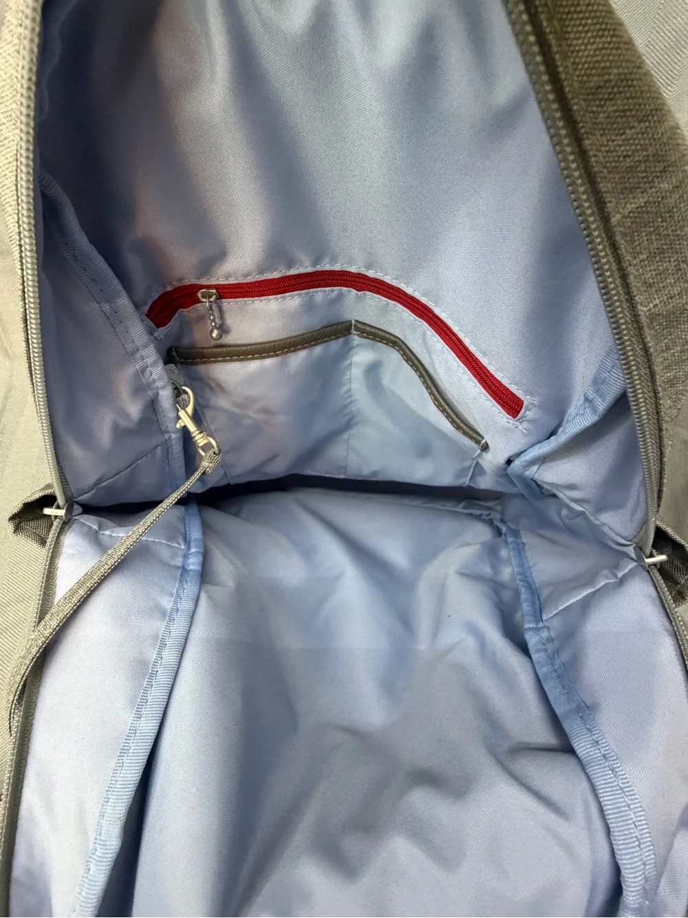 Baggallini all day backpack with handle multi pocket gray exterior blue interior